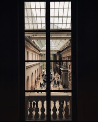a view of a museum through a window