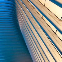 a blue building with a lot of slats